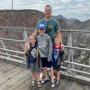Happy Father's Day: Papa Steve stands behind his three young sons on the Royal Gorge Bridge in Colorado. 