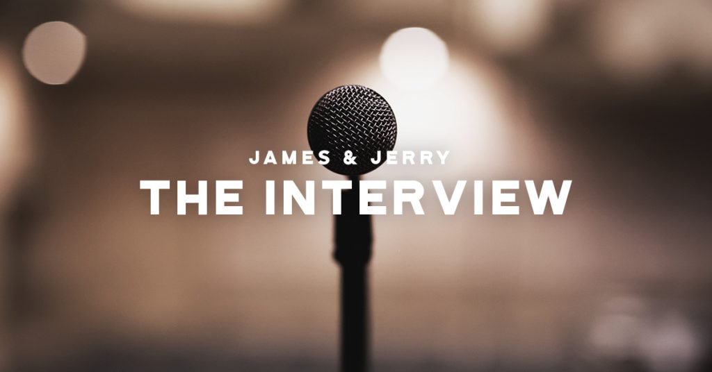 Image for Quilted Squirrel blog post: A standing microphone is aligned vertically in front of a spotlight shining through from the background. "JAMES & JERRY" is printed in small font on top of a larger font that reads "THE INTERVIEW."