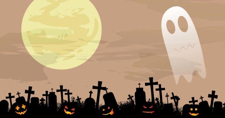 TQS takes on the supernatural: Tombstones and jack-o-lanterns sit beneath a full moon as a ghost rises amid the mist of a spooky cemetery.