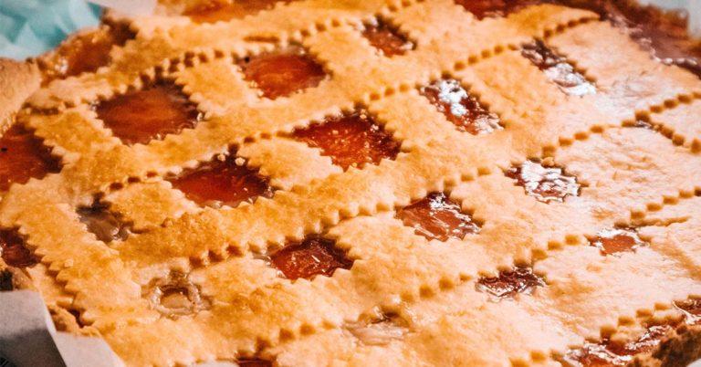 TQS takes on pie: An extreme close-up of a cherry pie with buttery lattice pastry topping